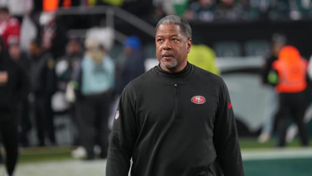 49ers defensive coordinator Steve Wilks on the field before a game.
